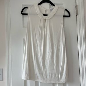 CAbi white long tank top with V-neck cut out and collar.